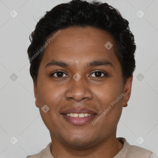 Joyful black young-adult male with short  black hair and brown eyes