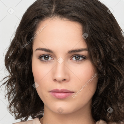 Neutral white young-adult female with long  brown hair and brown eyes