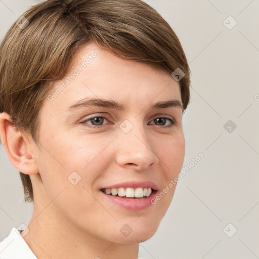 Joyful white young-adult female with short  brown hair and grey eyes