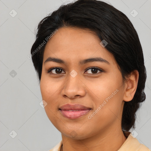 Joyful asian young-adult female with medium  brown hair and brown eyes