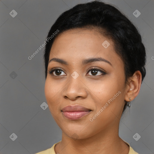 Joyful latino young-adult female with short  black hair and brown eyes