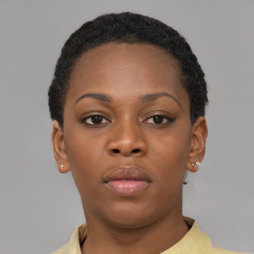 Neutral black young-adult female with short  black hair and brown eyes