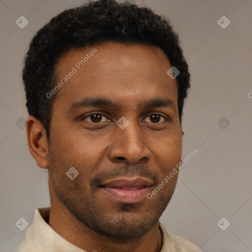 Joyful latino young-adult male with short  brown hair and brown eyes