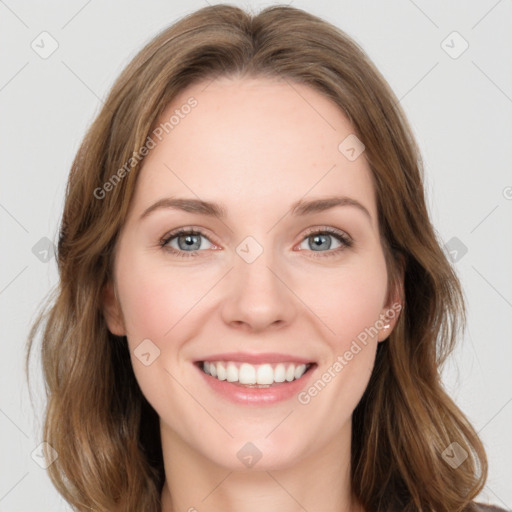 Joyful white young-adult female with medium  brown hair and green eyes