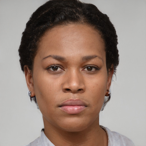 Neutral black young-adult female with short  brown hair and brown eyes