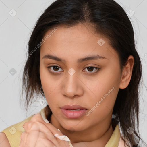 Neutral white young-adult female with medium  brown hair and brown eyes