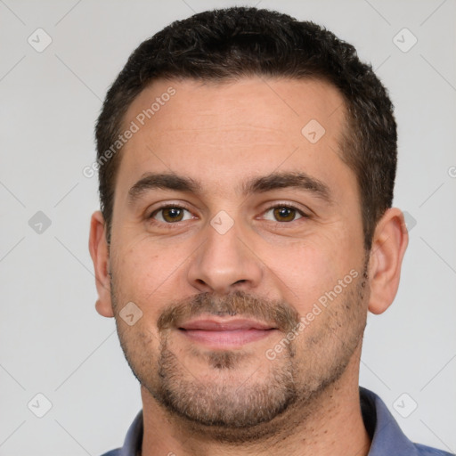 Joyful white adult male with short  brown hair and brown eyes