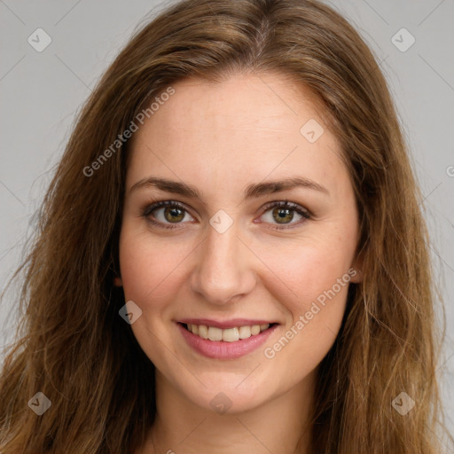 Joyful white young-adult female with long  brown hair and green eyes