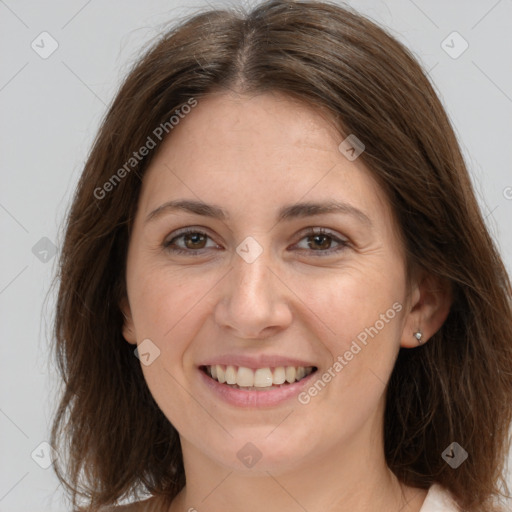 Joyful white young-adult female with medium  brown hair and grey eyes