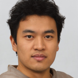 Neutral asian young-adult male with short  brown hair and brown eyes