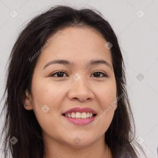 Joyful asian young-adult female with long  brown hair and brown eyes