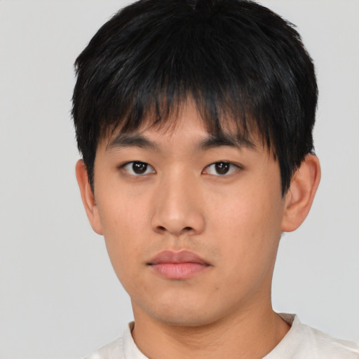 Neutral asian young-adult male with short  black hair and brown eyes