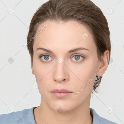 Neutral white young-adult female with medium  brown hair and grey eyes