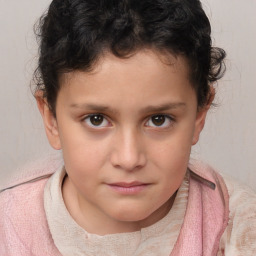 Joyful white child female with short  brown hair and brown eyes