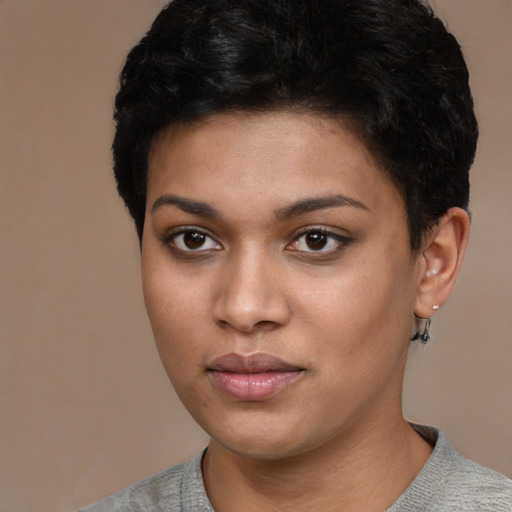 Neutral black young-adult female with short  black hair and brown eyes
