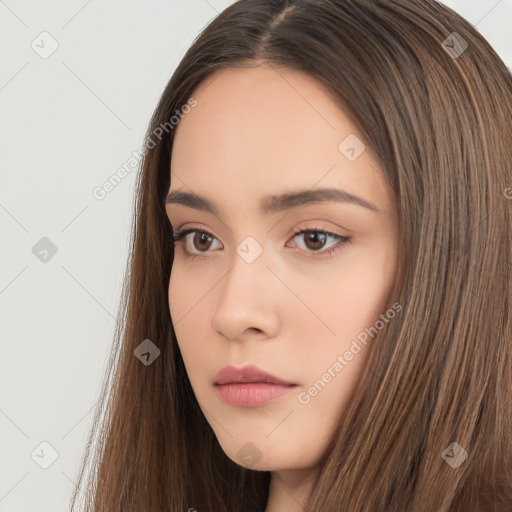 Neutral white young-adult female with long  brown hair and brown eyes