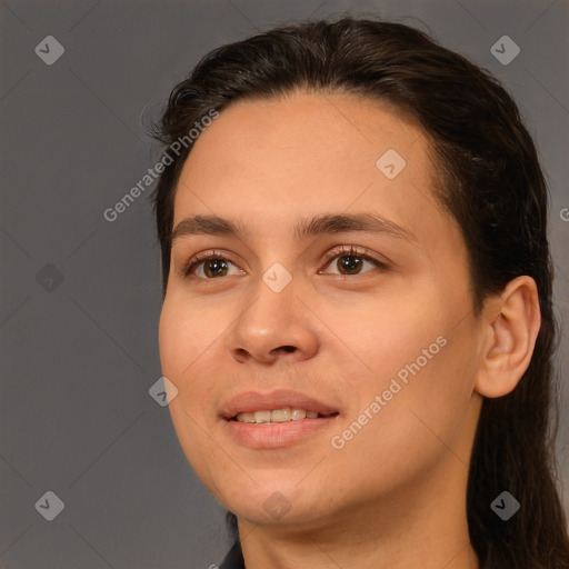 Joyful white young-adult female with long  brown hair and brown eyes