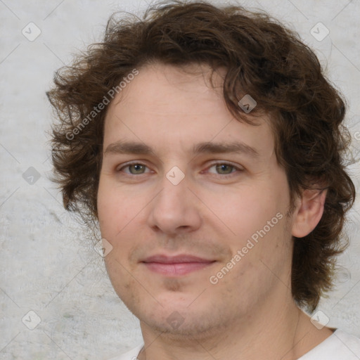 Joyful white young-adult male with medium  brown hair and brown eyes