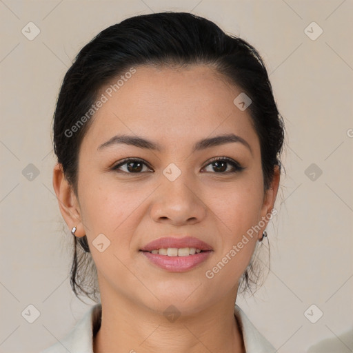 Joyful latino young-adult female with medium  brown hair and brown eyes