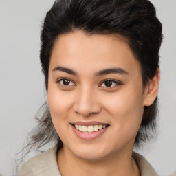 Joyful white young-adult female with medium  brown hair and brown eyes