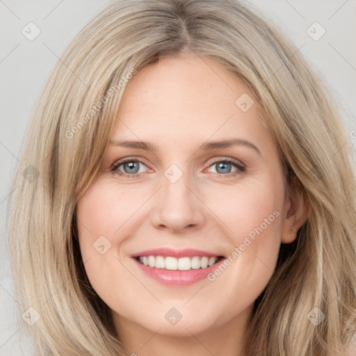 Joyful white young-adult female with long  brown hair and grey eyes