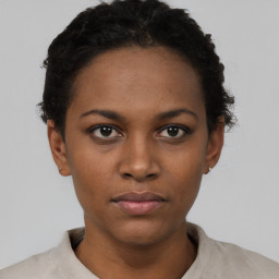 Neutral black young-adult female with short  black hair and brown eyes