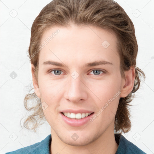 Joyful white young-adult female with medium  brown hair and blue eyes