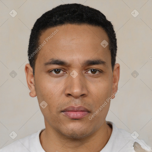 Neutral latino young-adult male with short  black hair and brown eyes