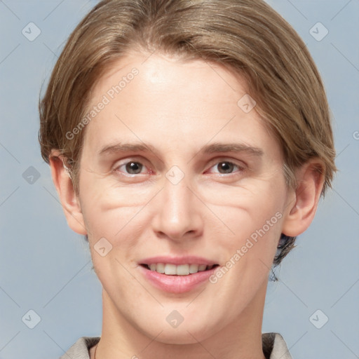 Joyful white adult female with medium  brown hair and grey eyes