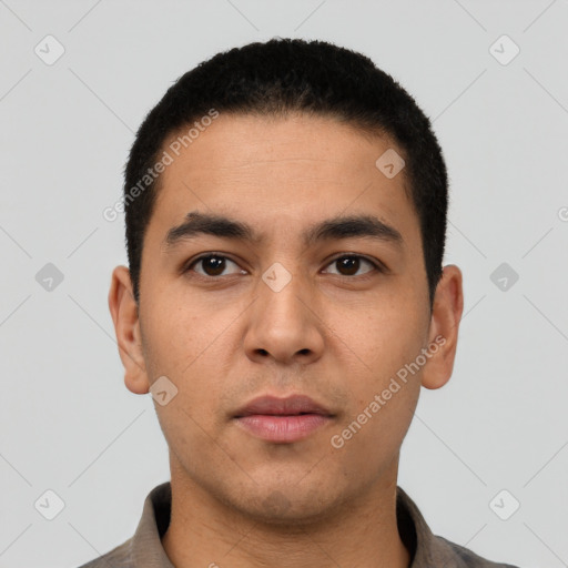 Neutral latino young-adult male with short  black hair and brown eyes