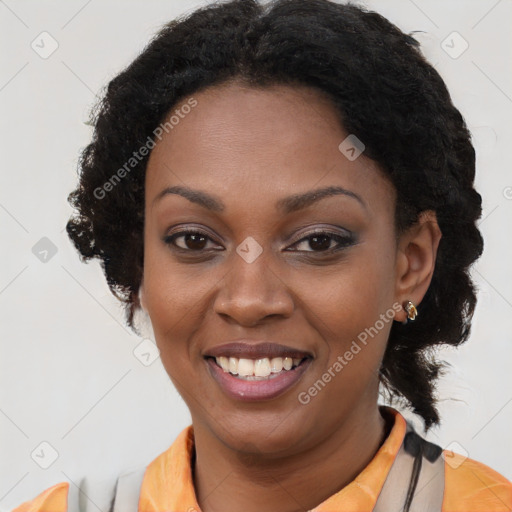 Joyful black young-adult female with long  brown hair and brown eyes