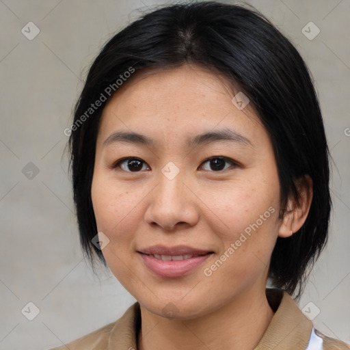 Joyful asian young-adult female with medium  brown hair and brown eyes