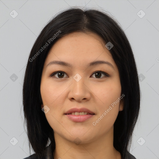 Joyful latino young-adult female with medium  brown hair and brown eyes