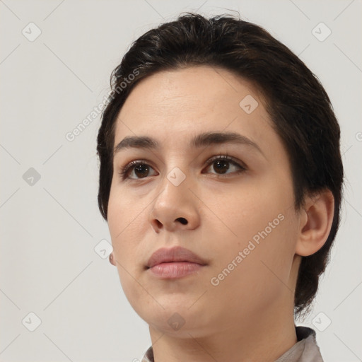 Neutral white young-adult female with short  brown hair and brown eyes