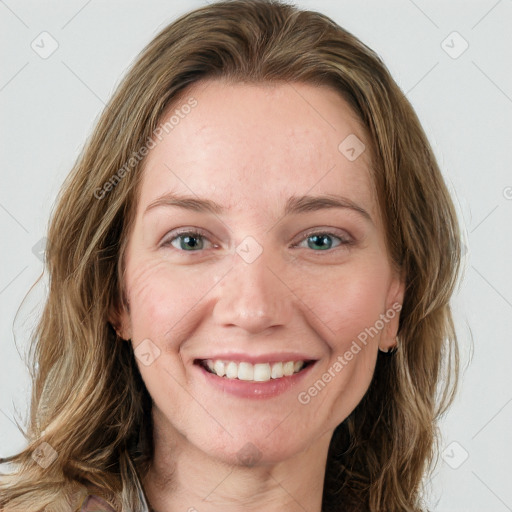 Joyful white young-adult female with long  brown hair and green eyes