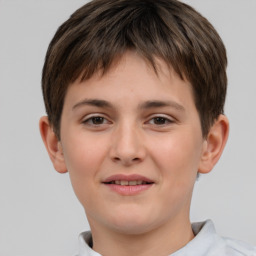 Joyful white child male with short  brown hair and brown eyes