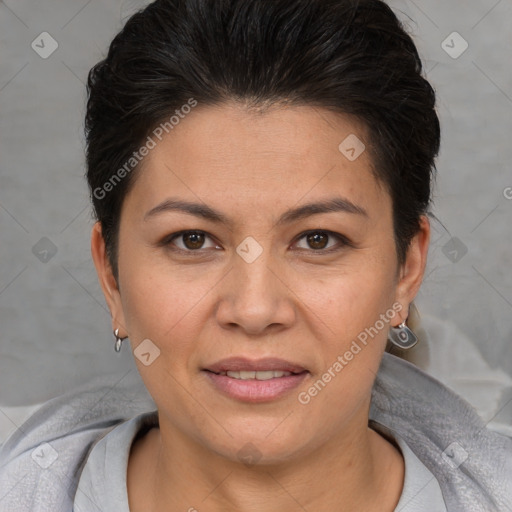 Joyful white adult female with short  brown hair and brown eyes