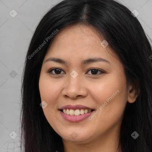 Joyful asian young-adult female with long  brown hair and brown eyes