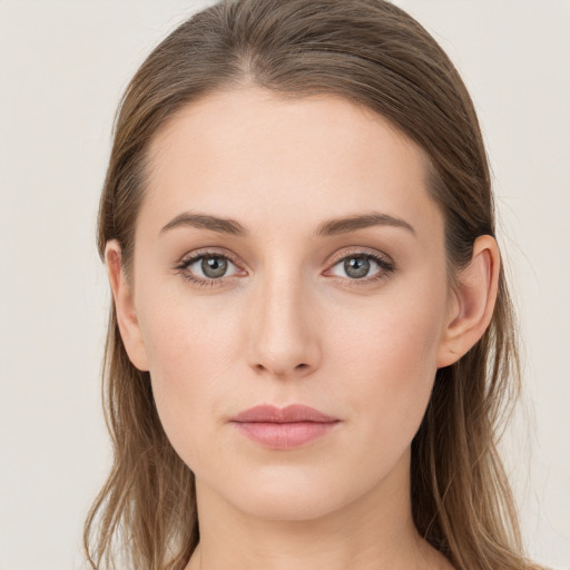 Neutral white young-adult female with long  brown hair and grey eyes