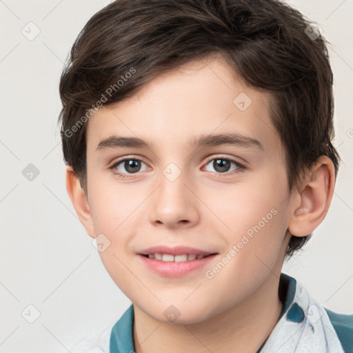 Joyful white child male with short  brown hair and brown eyes