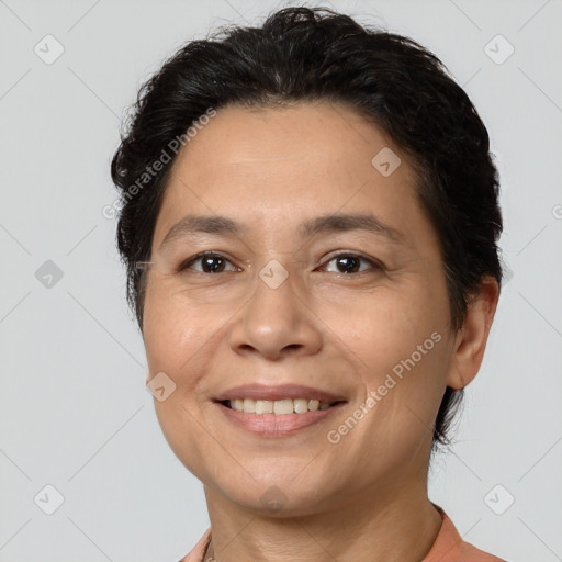 Joyful white adult female with short  brown hair and brown eyes