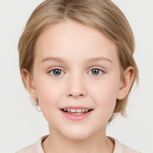 Joyful white child female with medium  brown hair and blue eyes