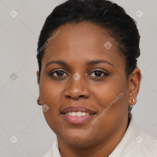 Joyful black young-adult female with short  brown hair and brown eyes