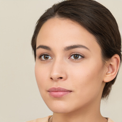 Neutral white young-adult female with medium  brown hair and brown eyes