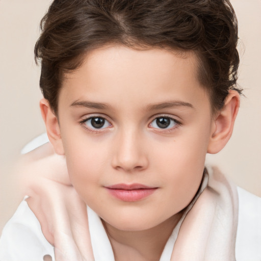 Joyful white child female with short  brown hair and brown eyes