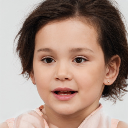 Joyful white child female with medium  brown hair and brown eyes