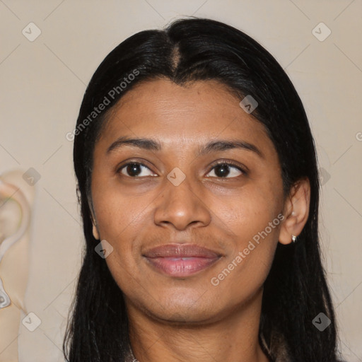 Joyful latino young-adult female with long  black hair and brown eyes