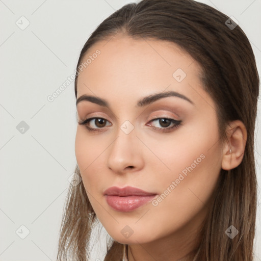 Neutral white young-adult female with long  brown hair and brown eyes