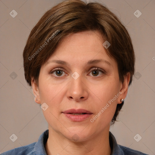 Joyful white adult female with medium  brown hair and brown eyes