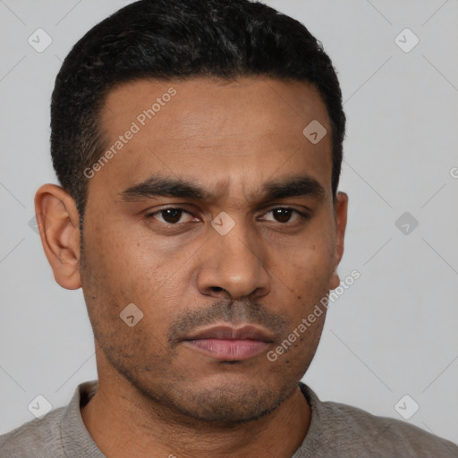Neutral latino young-adult male with short  black hair and brown eyes